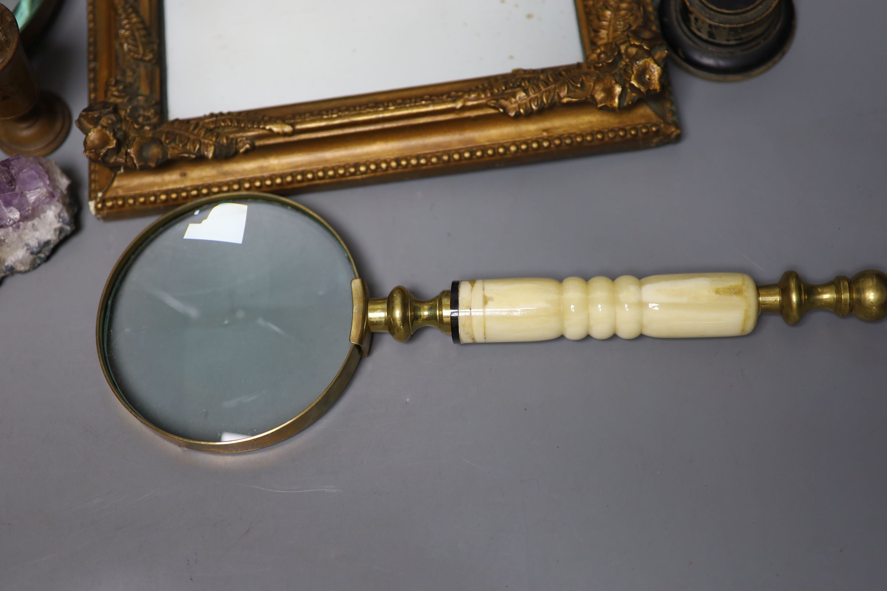 A group of objects of vertu, various frames, magnifying glasses etc.